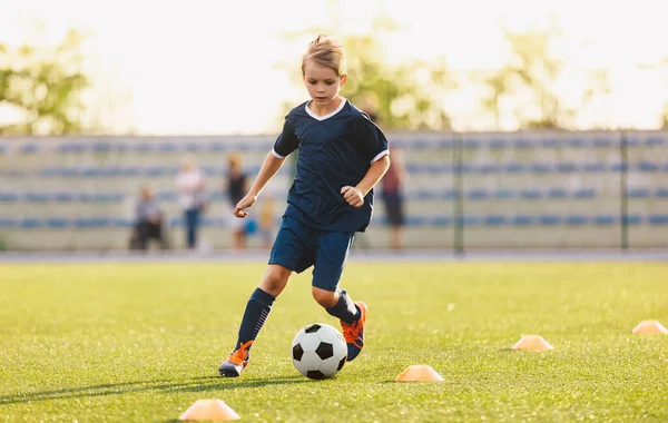depositphotos_423558278-stock-photo-young-boy-blue-soccer-jersey